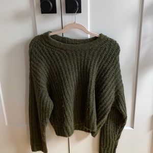 green sweater